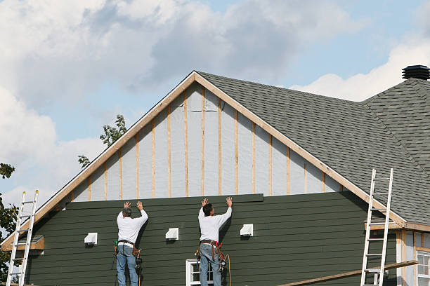 Professional Siding Installation technician working in Hutchinson, PA